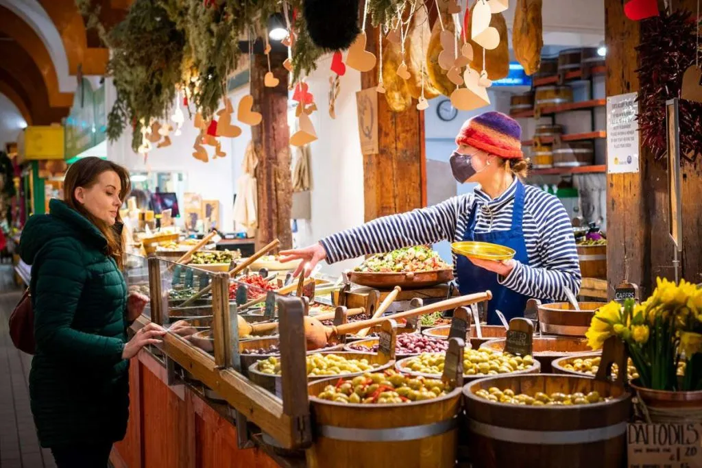 A customer is served in the English Market in Cork City 