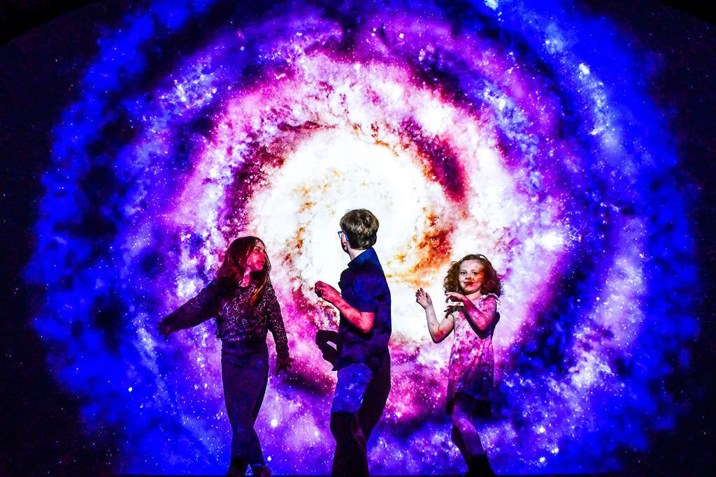 Three children play at the EPIC Museum in Dublin